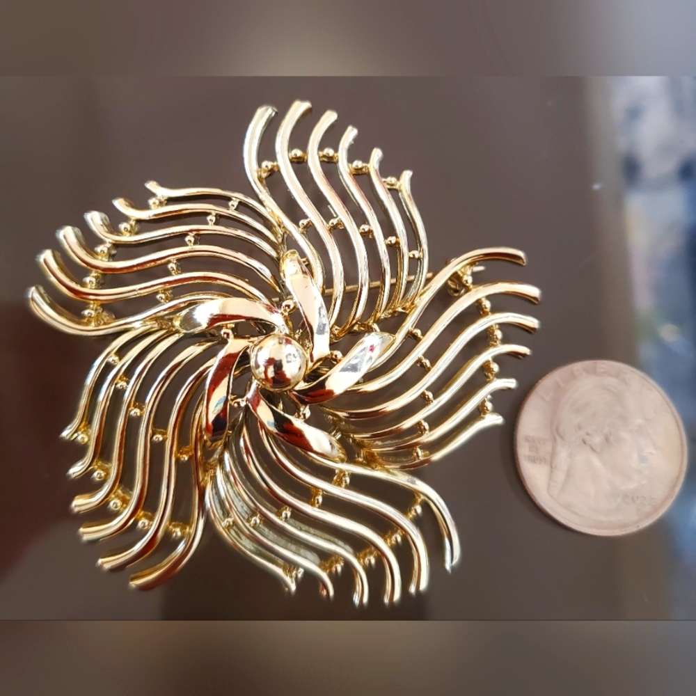 Pinwheel BSK goldtone pin brooch substantial size